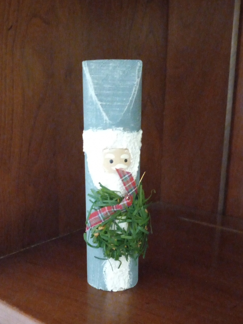 Handcrafted Powder Blue Wood Santa Holiday Figurine with Green Wreath